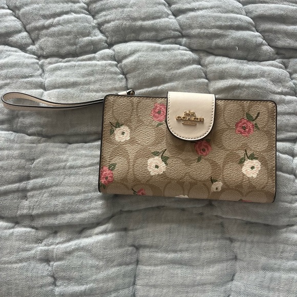 Coach Tan Wristlet with Pink and White Floral Design - Picture 1 of 3